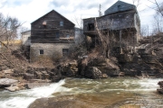 Fox-creek-falls-with-old-buildings