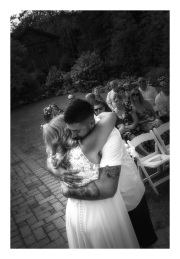 bride-and-son-hugging-bw